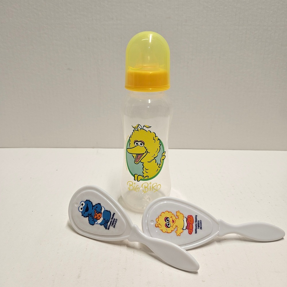 Vintage Sesame Street Big Bird Baby Bottle and Cookie Monster Hair Brush Set